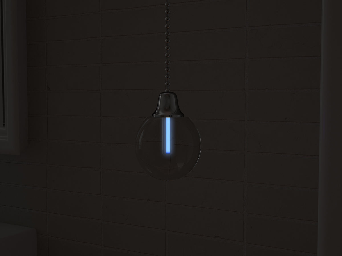 Vega tritium light pull with ice-blue glowing vial in the dark