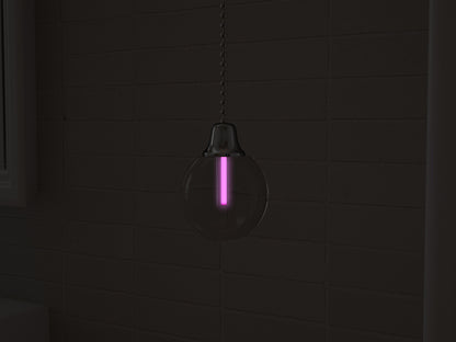Vega tritium light pull with pink glowing vial in the dark