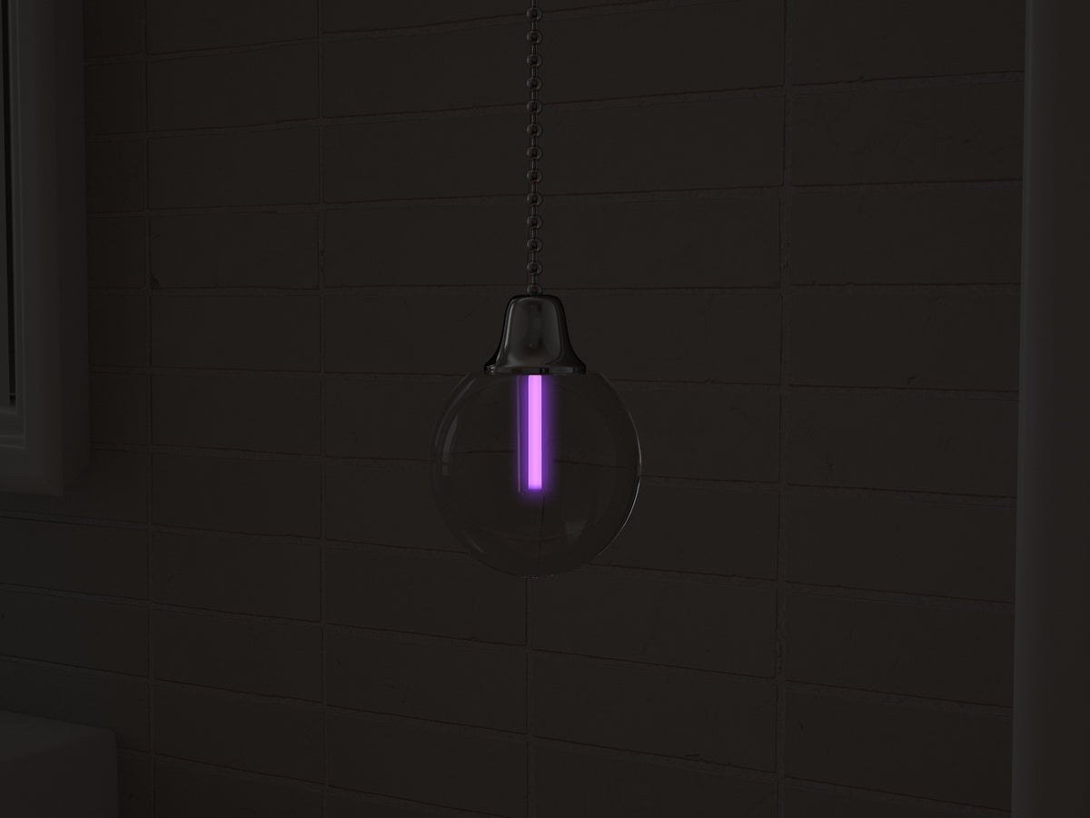 Vega tritium light pull with purple glowing vial in the dark